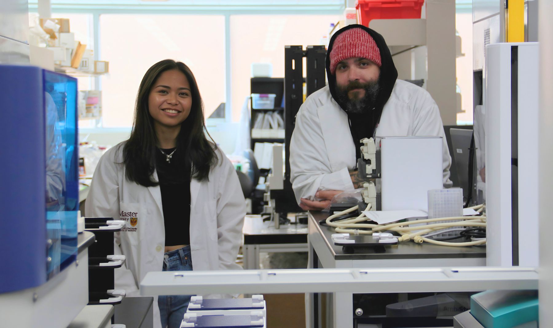 HBR 1025 Oct 8 Scientists wearing lab coats in a lab.